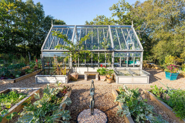 Side view of victorian greenhouse in kitchen garden - Cultivar ...